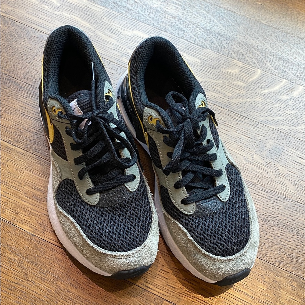 NikeBlack and Gray Sneakers with Gold Accents